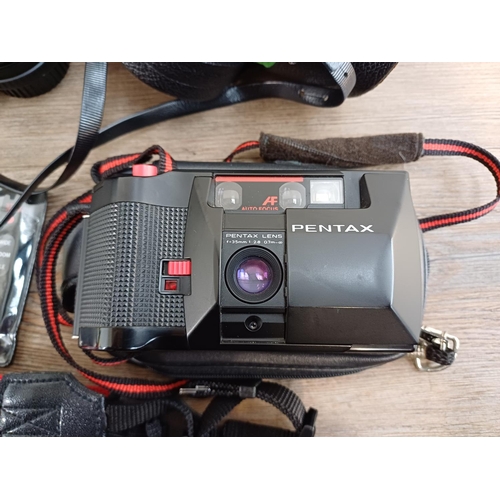 628 - A collection of cameras and accessories to include cased Pentax P30N 35mm SLR fitted with Sigma 1:3.... 