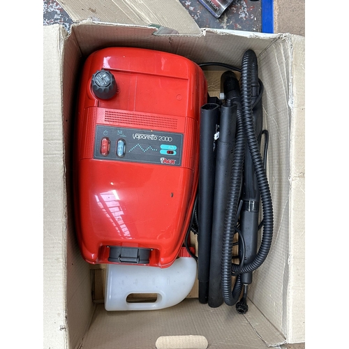 793 - A boxed Polti Vaporetto 2000 steam cleaner with attachments and accessories