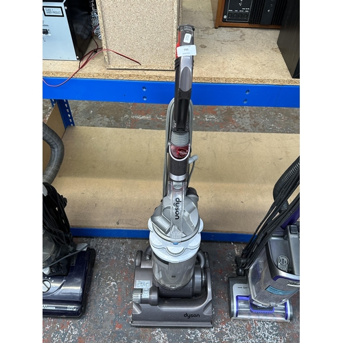 795 - A Dyson DC14 upright bagless vacuum cleaner