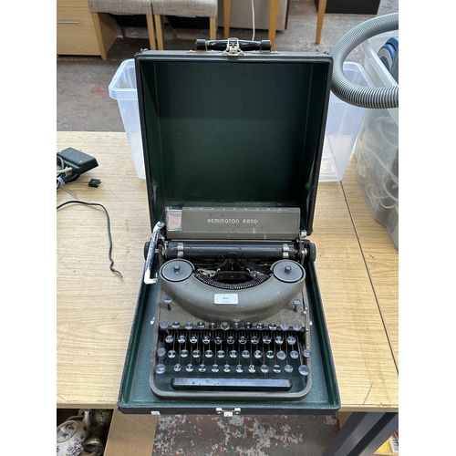 801 - A cased 1940s Remington Rand noiseless model 7 portable typewriter