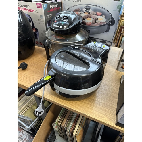 809 - Three items, one boxed Tower family size multi cooker, one Daewoo halogen cooker and one Tefal Actif... 