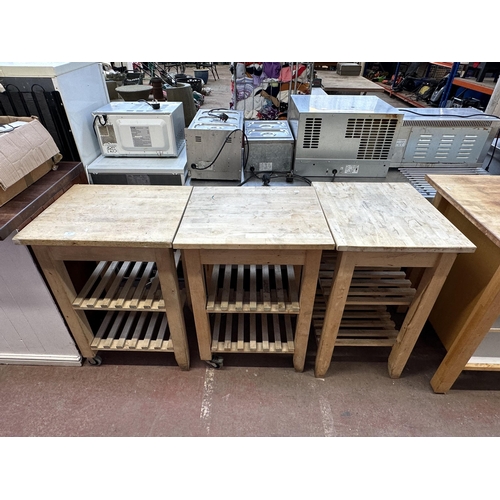 817 - Three beech kitchen trolleys - each approx. 60cm x 50cm