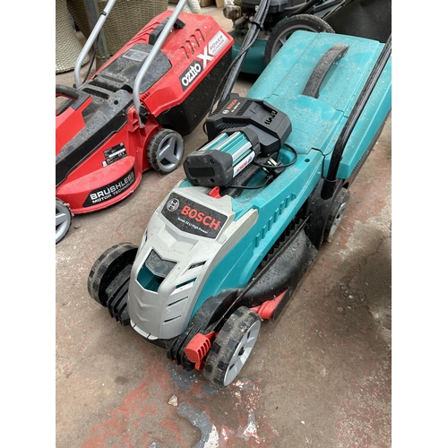 916 - Two electric cordless lawn mowers, one Bosch Rotak 32 LI High Power and one Ozito PXCLMS-118U