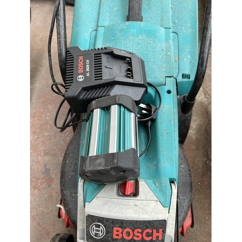 916 - Two electric cordless lawn mowers, one Bosch Rotak 32 LI High Power and one Ozito PXCLMS-118U