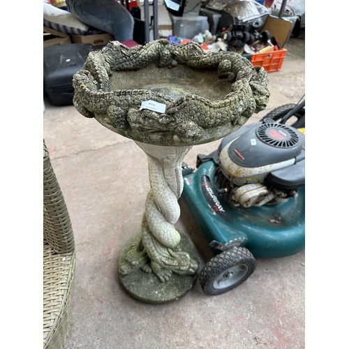 919 - A cast stone pedestal bird bath with dragon design - approx. 72cm high x 36cm diameter