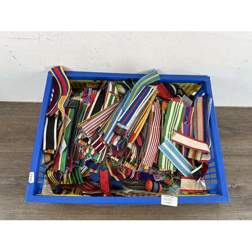 2232E - A box containing a large quantity of military medal ribbon