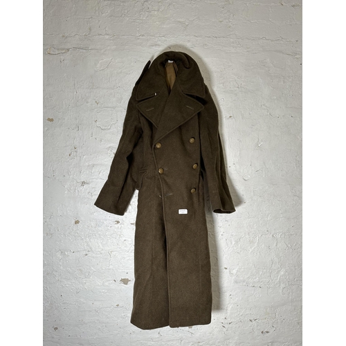 2232J - A green military overcoat with WWI British General Service Corps buttons