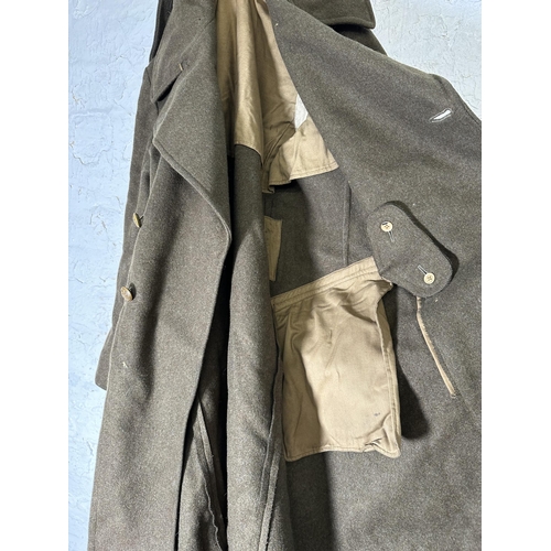 2232J - A green military overcoat with WWI British General Service Corps buttons