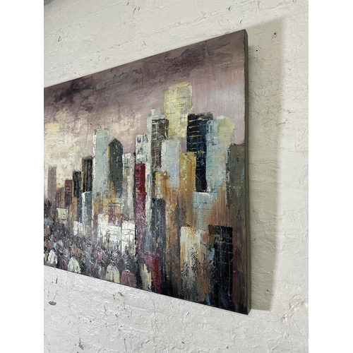 243 - A modern unframed acrylic on canvas - approx. 70cm high x 142cm wide