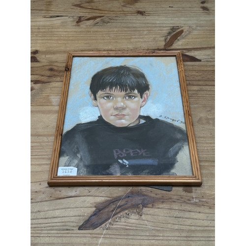 263A - A framed G. Shopov pastel portrait of a young boy, dated 1990 - approx. 38cm high x 30cm wide