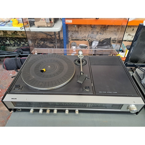 662 - A Philips 876 stereo music centre comprising belt-drive two-speed turntable fitted with Audio Techni... 