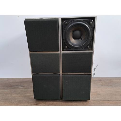 667 - A pair of Bang & Olufsen BeoVox CX100 brushed aluminium passive bookshelf hi-fi speakers