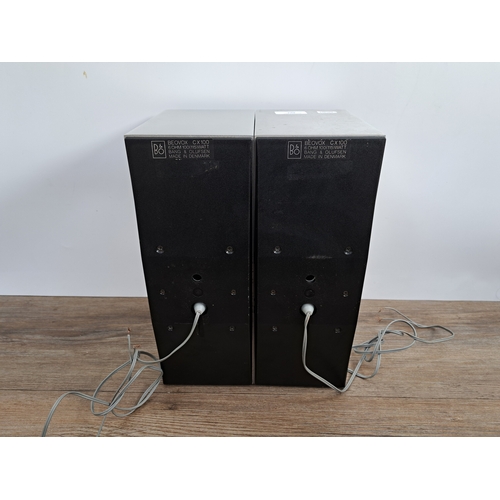 667 - A pair of Bang & Olufsen BeoVox CX100 brushed aluminium passive bookshelf hi-fi speakers