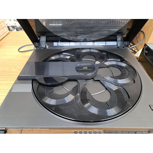 671 - Five pieces of Technics hi-fi, one SL-PC20 five-disc-changer CD player, one ST-Z990L three-band tune... 