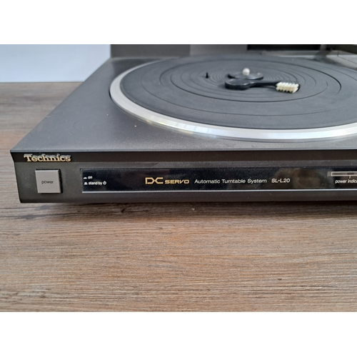 673 - A Technics SL-L20 linear tracking two-speed turntable