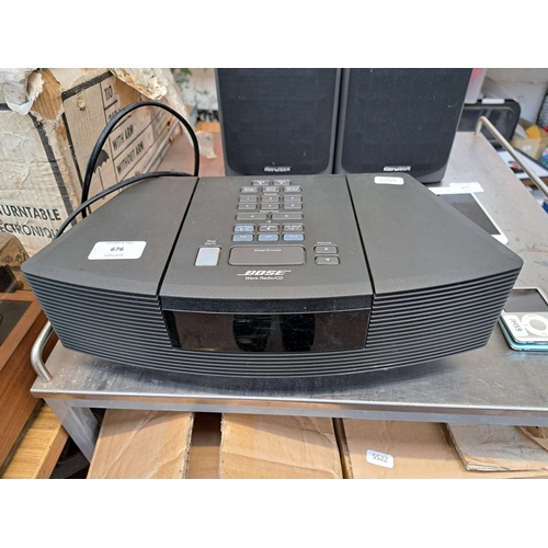 676 - A Bose Wave AWRC-2G two-band radio/CD player