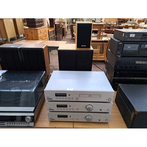 682 - A collection Acoustic Solutions hi-fi to include SP121 CD player, two SP101 amplifiers, pair AV-150B... 