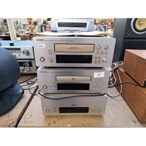 694 - Three items of Denon hi-fi, one UDR-F07 Dolby B/C cassette deck, one UCD-F07 CD player and UTU-F07 t... 