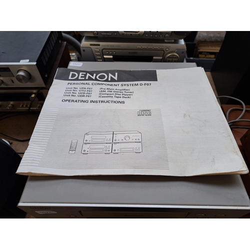 694 - Three items of Denon hi-fi, one UDR-F07 Dolby B/C cassette deck, one UCD-F07 CD player and UTU-F07 t... 