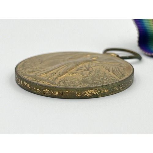 2221 - Three WWI British Victory medals, one presented to 250304 GNR. A. Campbell R. A., one presented to 4... 