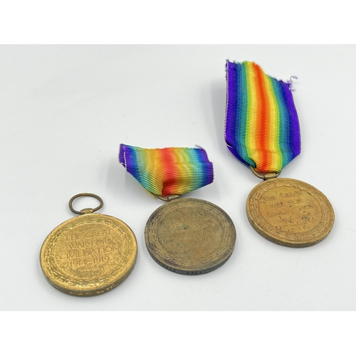 2221 - Three WWI British Victory medals, one presented to 250304 GNR. A. Campbell R. A., one presented to 4... 