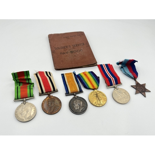 2226 - Six medals, two WWI presented to M. 2-135633 Pte. H. Robinson A. S. C. with Soldier's Service and Pa... 