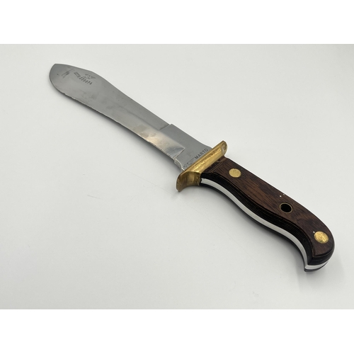 2232B - A Marto Tolido Auto-Europa hunting knife with brass and wooden handle