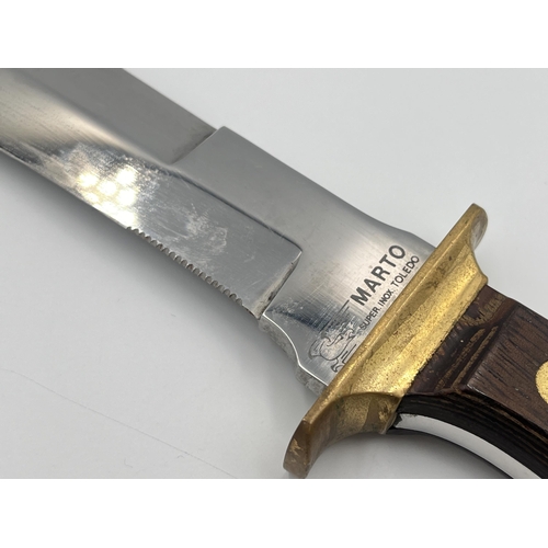 2232B - A Marto Tolido Auto-Europa hunting knife with brass and wooden handle