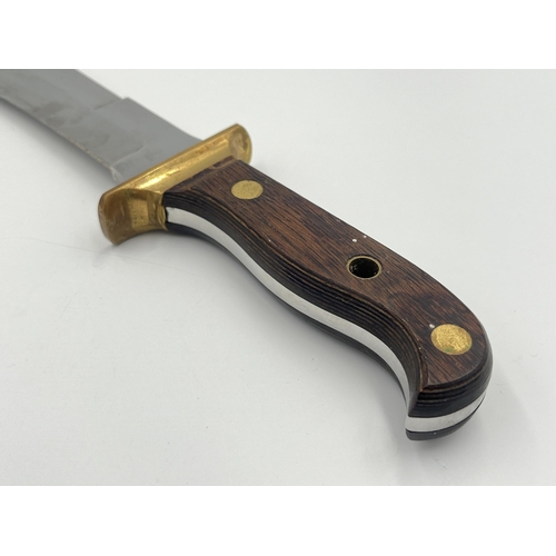 2232B - A Marto Tolido Auto-Europa hunting knife with brass and wooden handle