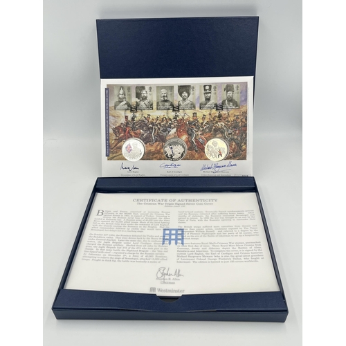 2237 - A boxed 2004 Westminster The Crimean War Triple Signed silver proof limited edition to 195 five poun... 