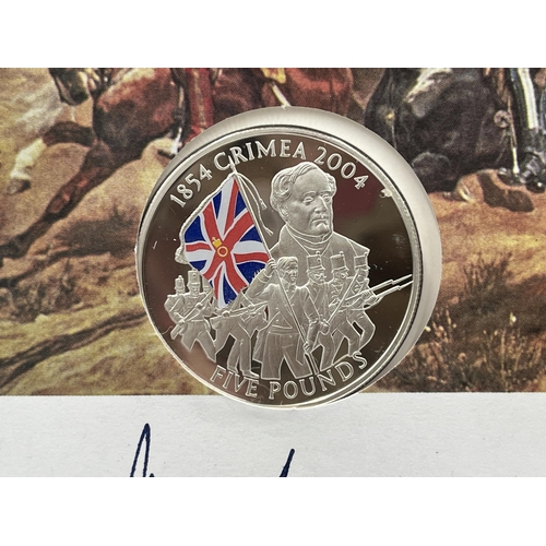 2237 - A boxed 2004 Westminster The Crimean War Triple Signed silver proof limited edition to 195 five poun... 