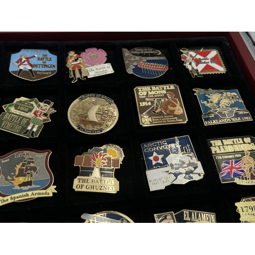 2248 - A cased collection of 50 Danbury Mint British Victory Collector pin badges