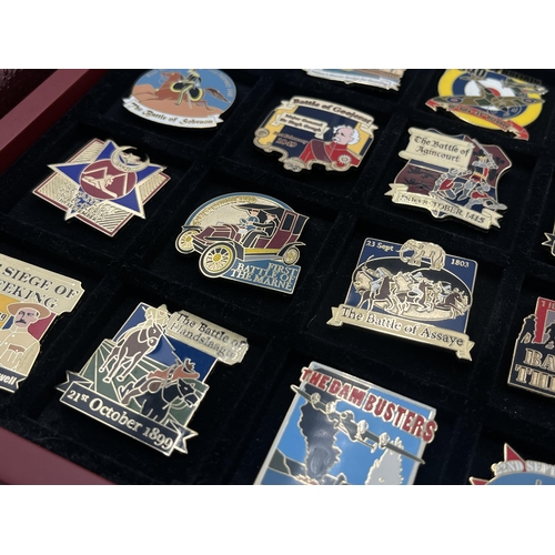 2248 - A cased collection of 50 Danbury Mint British Victory Collector pin badges