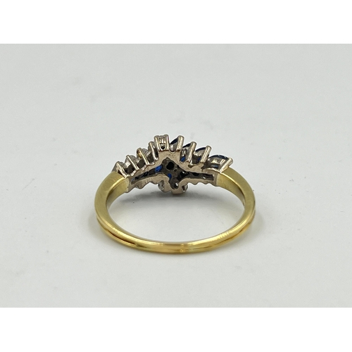 2330 - A hallmarked 18ct gold sapphire and diamond cluster ring, size P½ - approx. gross weight 3.9g