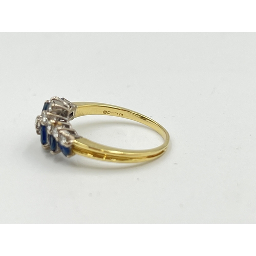 2330 - A hallmarked 18ct gold sapphire and diamond cluster ring, size P½ - approx. gross weight 3.9g