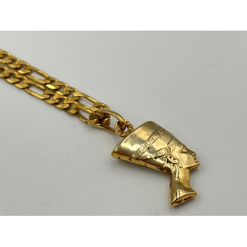 2331 - A 9ct gold chain necklace with 9ct gold Egyptian Nefertiti pendant - approx. gross weight 9.9g