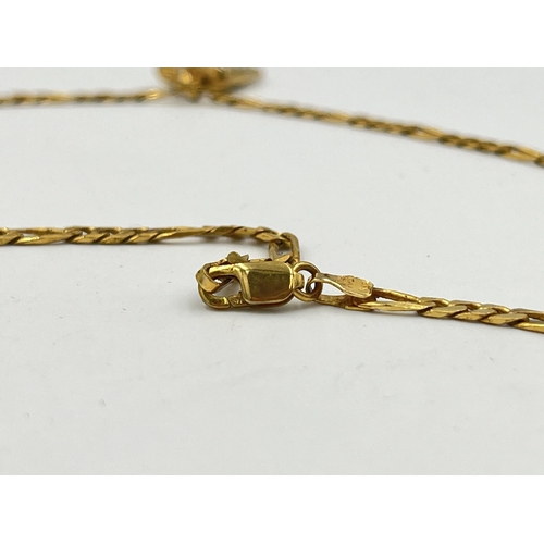 2331 - A 9ct gold chain necklace with 9ct gold Egyptian Nefertiti pendant - approx. gross weight 9.9g