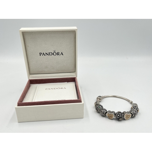 2334 - Seven pieces of Pandora .925 silver jewellery, two charm bracelets, three rings, one bangle and one ... 