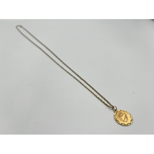 2337 - A hallmarked Chester 9ct gold pendant and yellow metal necklace - approx. gross 9ct weight 1.93