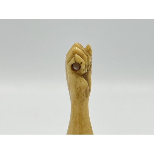 2350 - A boxed Victorian hand carved bone wax seal with hidden photograph of two nude ladies