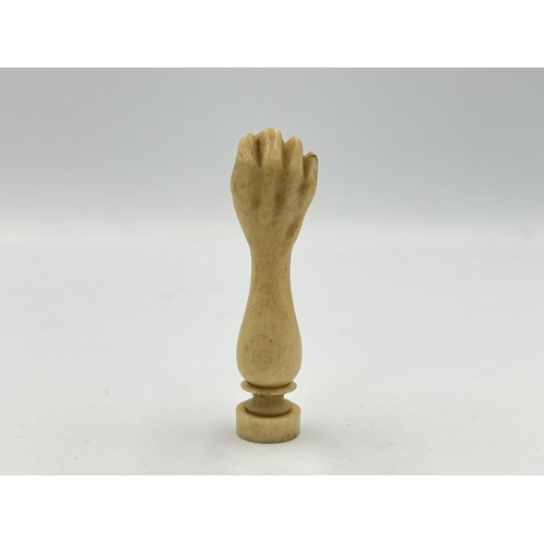 2350 - A boxed Victorian hand carved bone wax seal with hidden photograph of two nude ladies