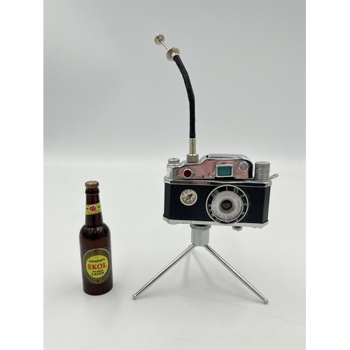 2351 - Two vintage items, one boxed Photo-Flash table lighter in the form of SLR camera and one bottle open... 