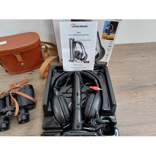 638 - Two items, one cased pair of Columbia 6 x 30 binoculars and one pair of Accelerate 5-in-1 wireless h... 