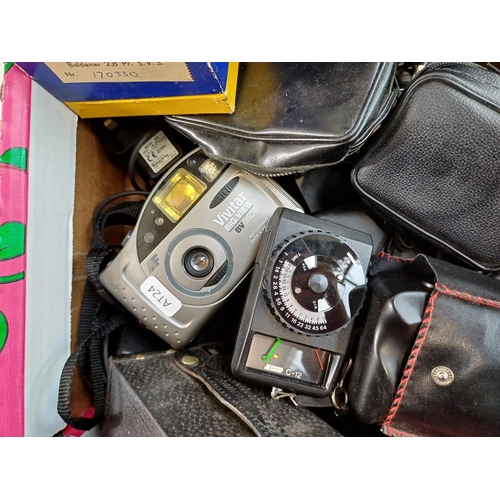 643 - Two boxes containing a large collection of cameras and accessories to include Vivitar Big View BV35D... 