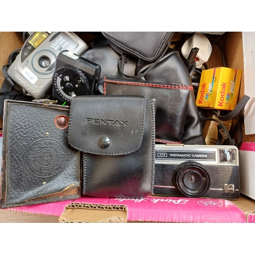 643 - Two boxes containing a large collection of cameras and accessories to include Vivitar Big View BV35D... 