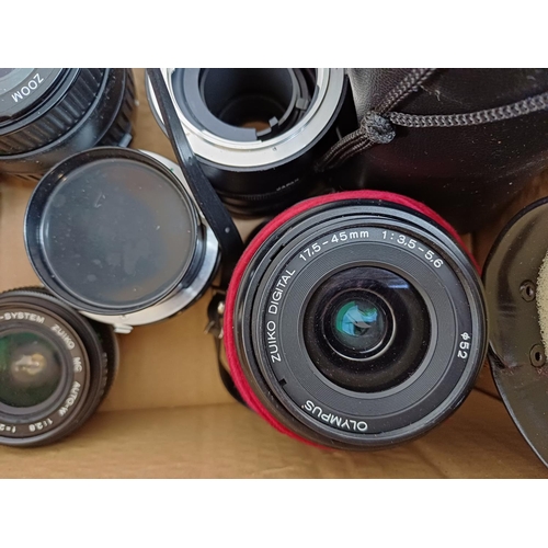 645 - A collection of camera lenses to include Vivitar, Canon, Olympus Zuiko, Sigma, Konica Hexanon etc.