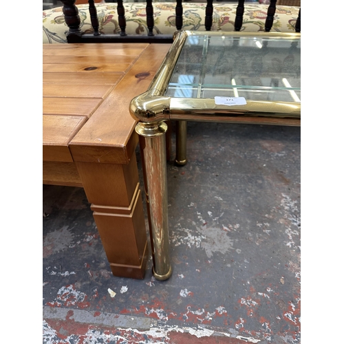 171 - A brass and bevelled glass coffee table