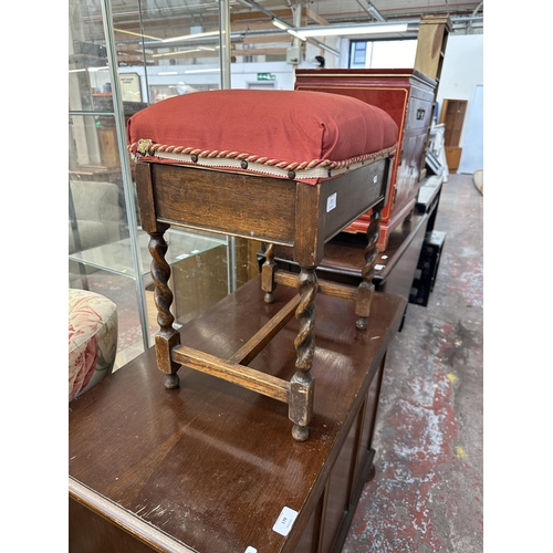 177 - A mid 20th century oak barley twist upholstered piano stool