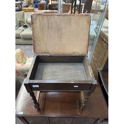 177 - A mid 20th century oak barley twist upholstered piano stool