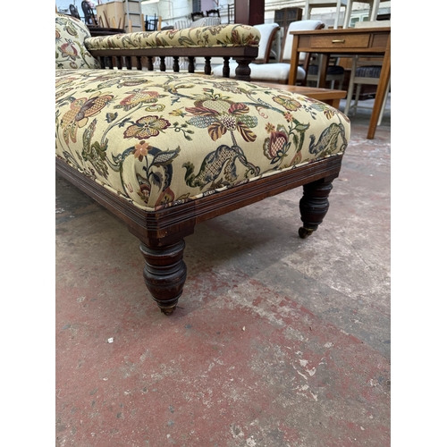 199 - A Victorian carved mahogany and floral fabric upholstered chaise longue - approx. 70cm high x 64cm w... 